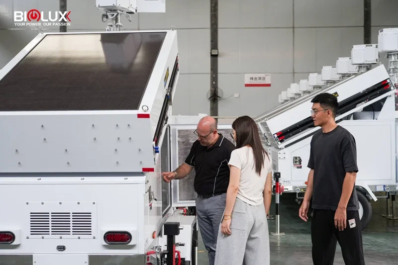 Australian clients inspect mobile solar cctv tower at BIGLUX production factory Australian clients inspect mobile solar cctv tower at BIGLUX production factory
